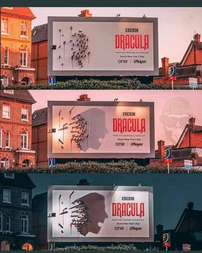 Three panel progression of a Dracula billboard using real stakes to cast a shadow silhouette of a vampire face.