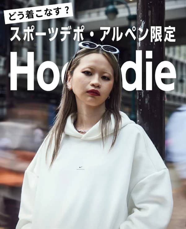 A Japanese fashion ad where the model accidentally blocks a letter, changing "Hoodie" to "Ho die".