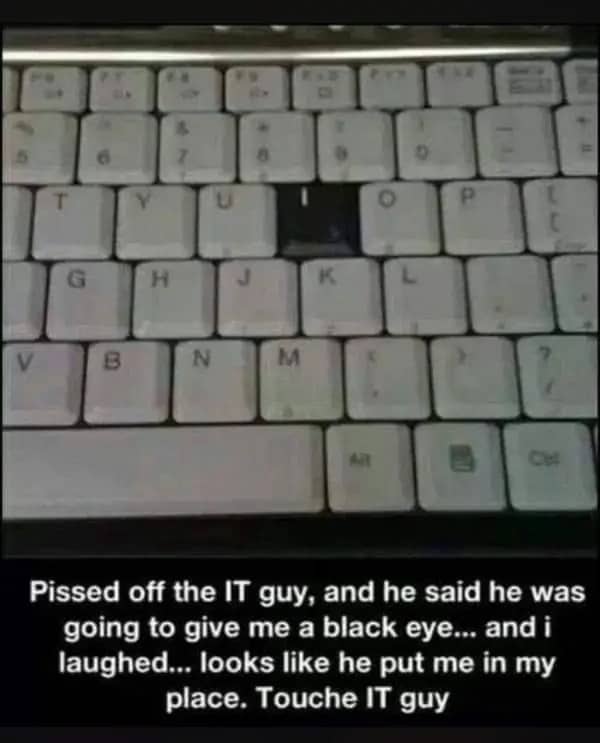 A close-up of a computer keyboard featuring a single black key replacing the letter I.