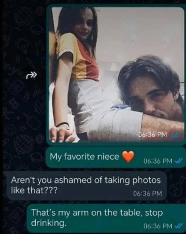 A text message exchange showing a misleading photo angle of a man's hairy arm resting on a table.