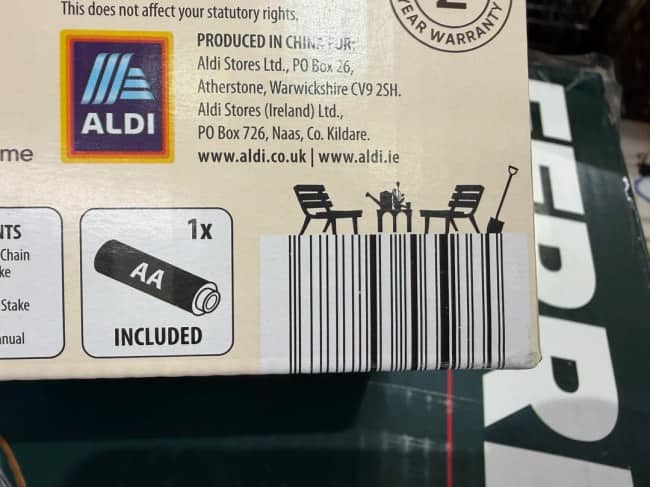 A creative barcode showing a backyard patio scene with chairs and a table atop the lines.