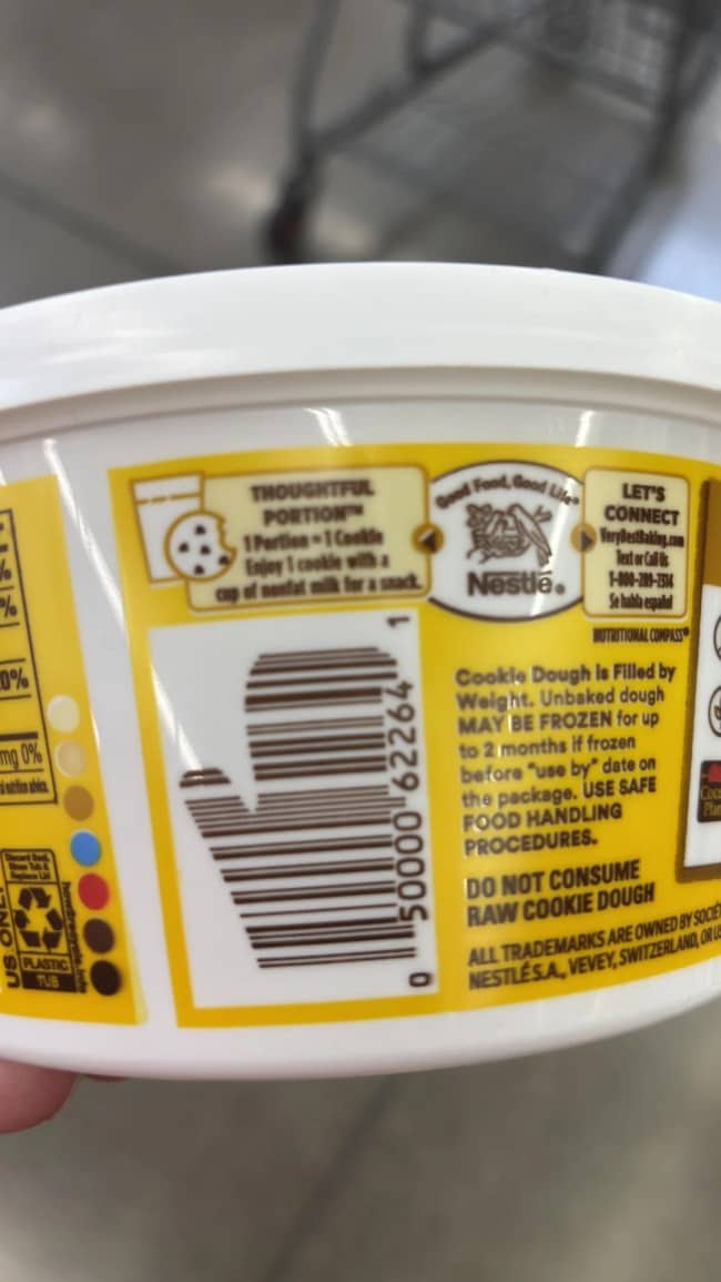 A creative barcode shaped like a winter mitten on a Nestlé cookie dough container.