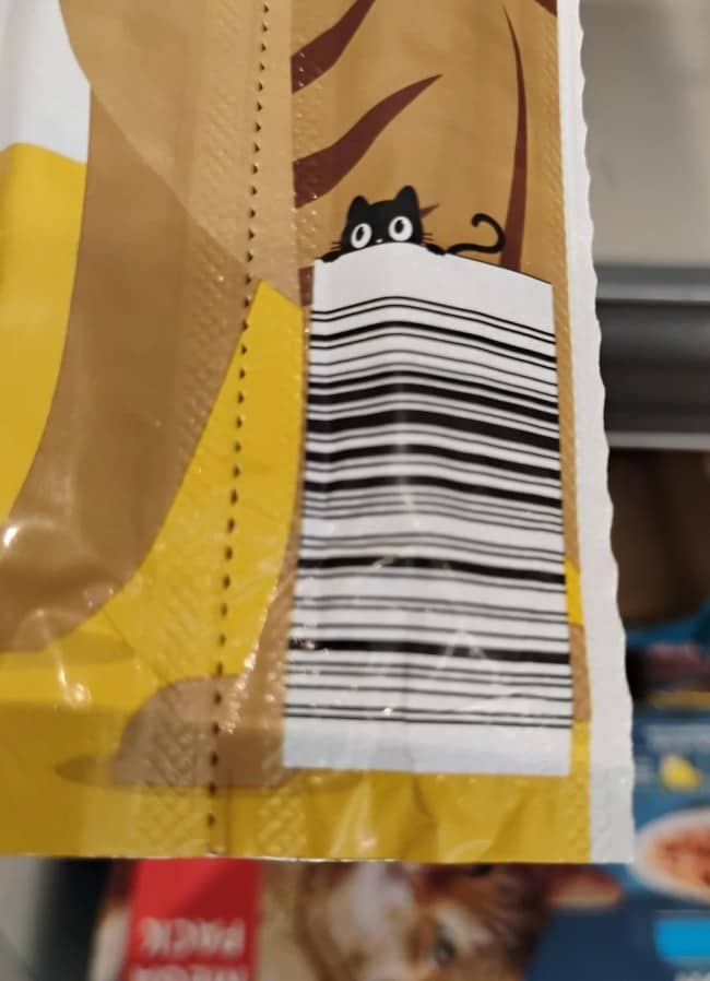 A creative barcode featuring a sneaky black cat peaking over the top of the white box.