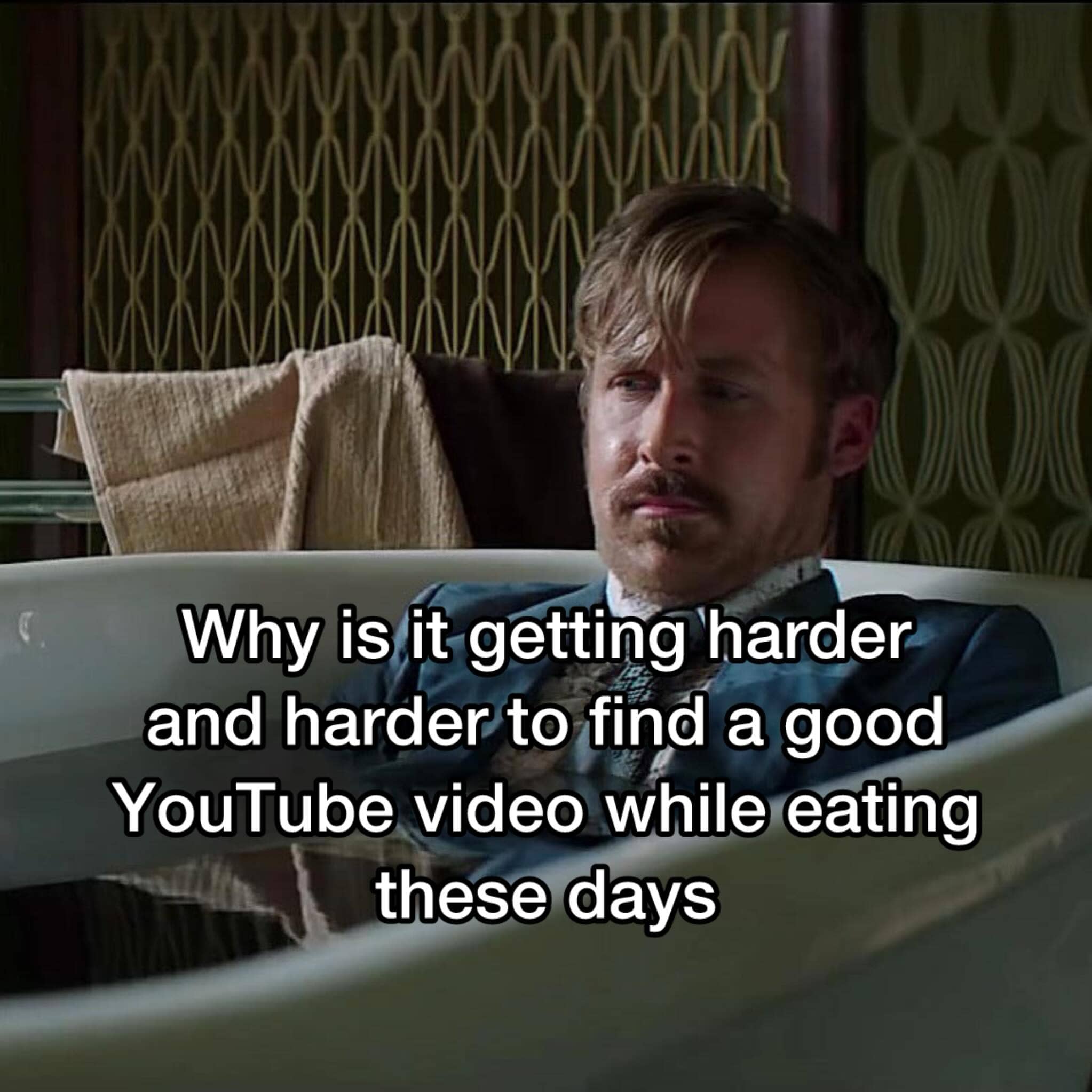 Ryan Gosling sitting fully clothed inside a bathtub looking deeply exhausted YouTube video meme.