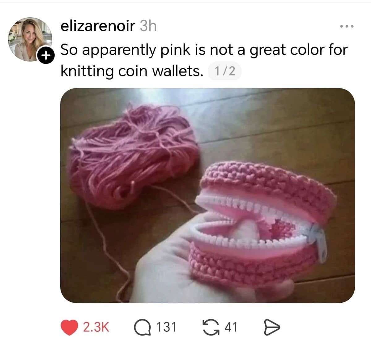 Crocheted pink yarn coin purse with a white zipper resembling an open mouth with teeth.