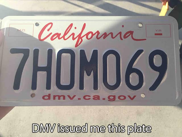 A California license plate reading 7HOM069 with text stating the DMV issued it.