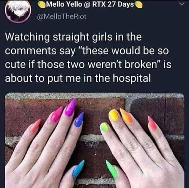 Rainbow manicure showing short index and middle fingernails referencing lesbian culture nail trends.