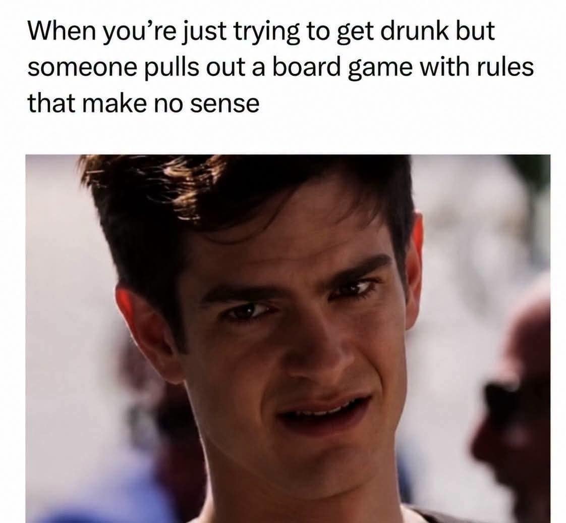 A relatable classic meme captures a close-up cinematic still of actor Andrew Garfield from The Social Network looking intensely bewildered and disgusted. The top text perfectly describes social friction, reading: "When you’re just trying to get drunk but someone pulls out a board game with rules that make no sense."