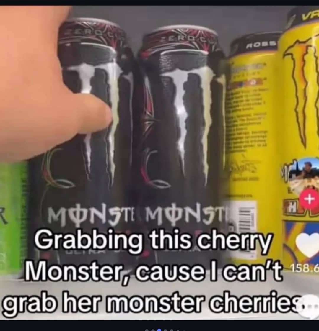 Hand reaching for a black Monster Energy drink can with a funny text caption overlay.