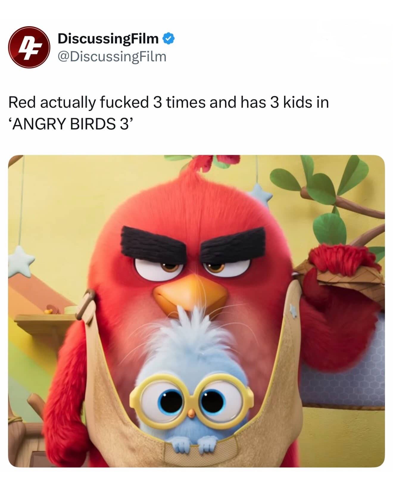 Animated red bird character from Angry Birds carrying a tiny blue bird in a baby carrier.