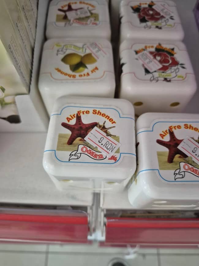 Product packaging of ocean themed air fresheners misspelled on the label as Air Fre Shener.
