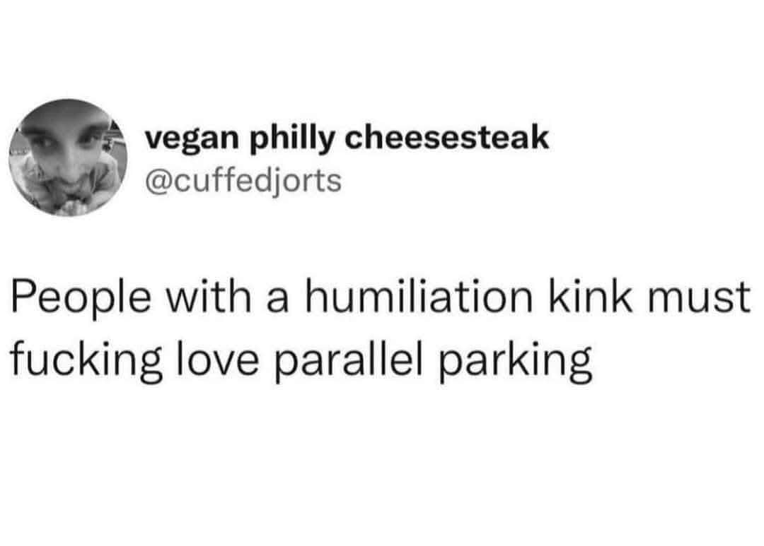 Tweet by vegan philly cheesesteak joking that people with a humiliation kink must love parallel parking.