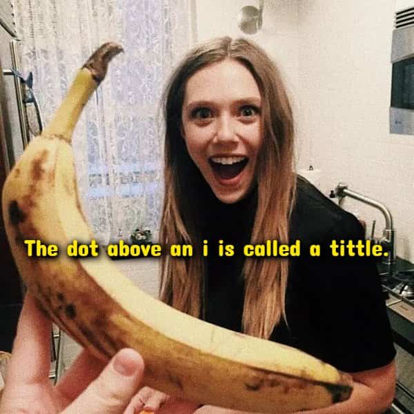 Elizabeth Olsen holding a giant banana with grammar trivia overlay about random useless facts.