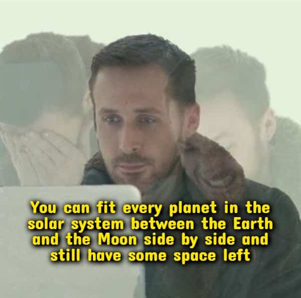 Ryan Gosling staring intensely at a laptop screen reading space trivia random useless facts.