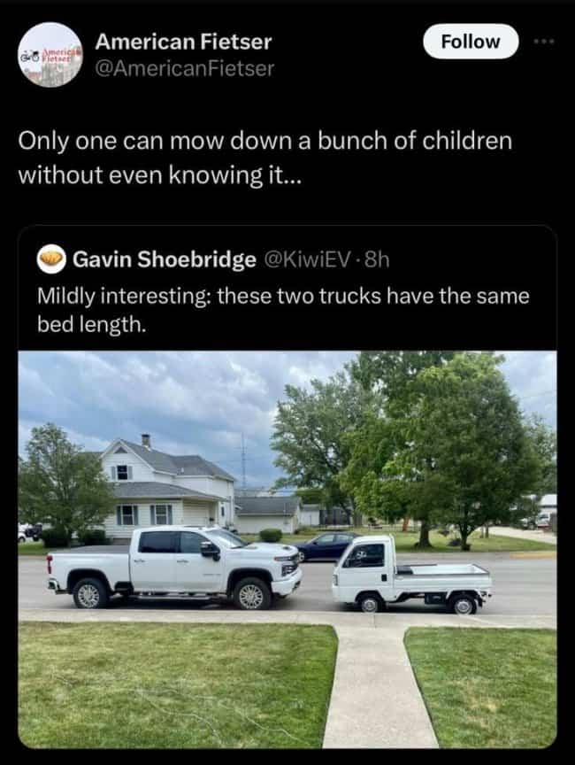 Massive pickup truck next to small Japanese utility truck with equal bed lengths.