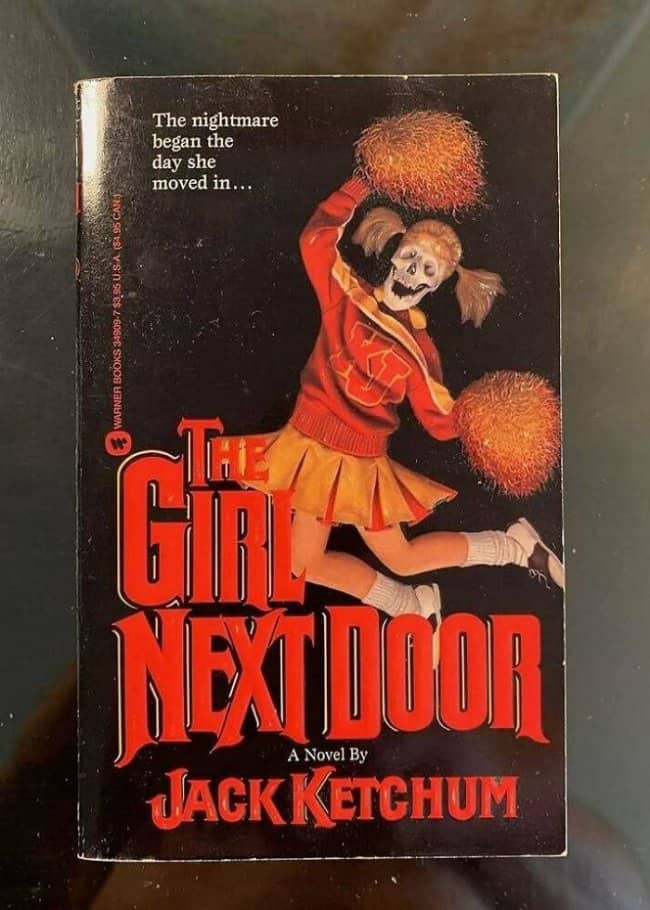 Retro horror paperback novel cover featuring a skeletal cheerleader pom-poming into the abyss.