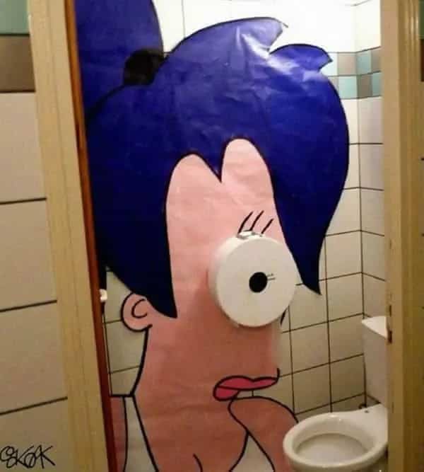 Futurama character Leela bathroom wall painting featuring toilet paper roll dispenser forming her eye.