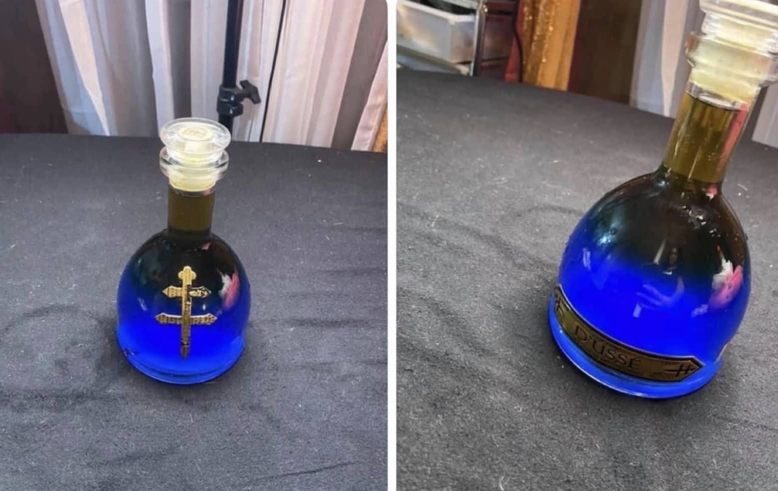 Glass D'USSÉ cognac bottle filled with glowing blue mana potion liquid on table meme