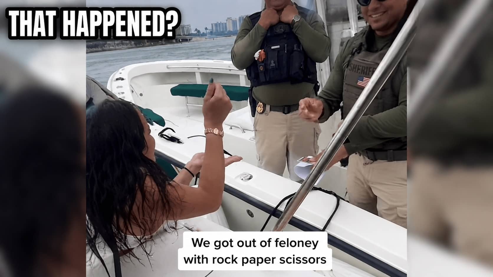 Woman on a boat playing rock paper scissors with police officers to avoid a felony.
