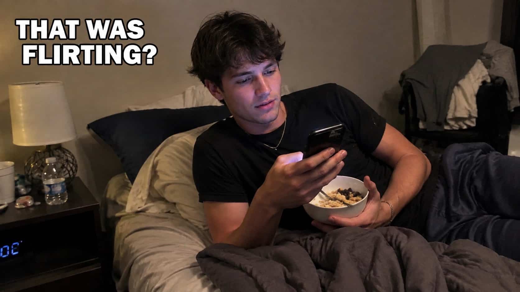 Man sitting in bed reading text on phone with bowl of cereal for flirty text fails.