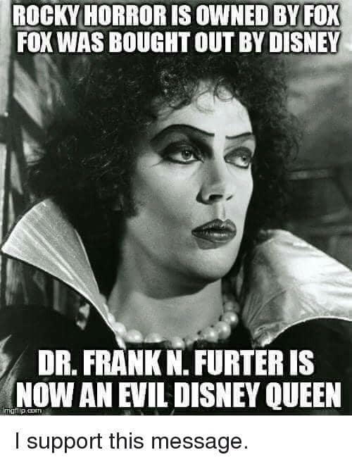Close-up of Dr. Frank-N-Furter from The Rocky Horror Picture Show, with meme text pointing out that Disney's acquisition of Fox technically makes him an official Disney Queen.