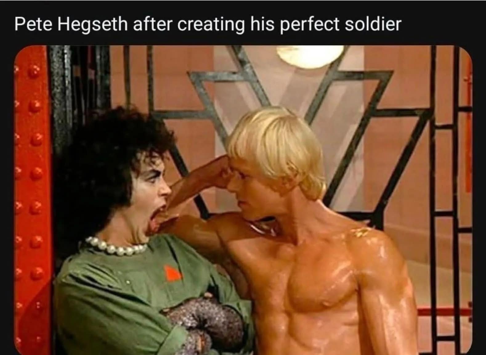 Screen capture of Dr. Frank-N-Furter admiring the musclebound Rocky in The Rocky Horror Picture Show, captioned as a political satire about creating a soldier.