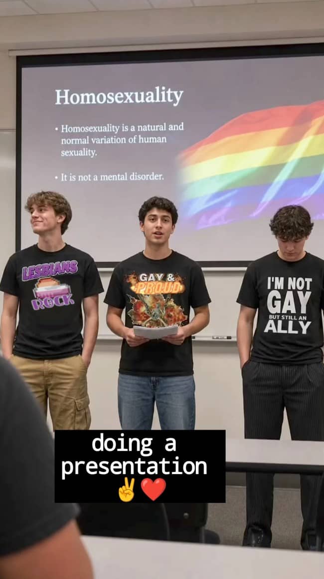 Three male students presenting about homosexuality while wearing supportive and humorous LGBTQ ally shirts.
