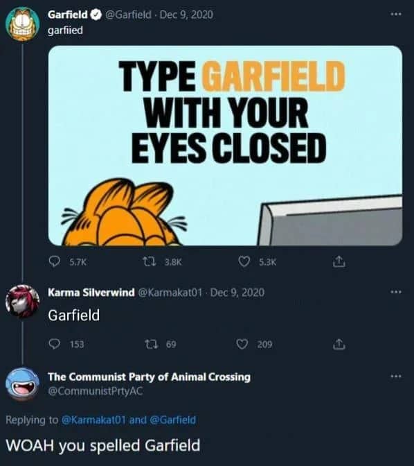 Twitter interaction where a user successfully types the word Garfield with their eyes closed.