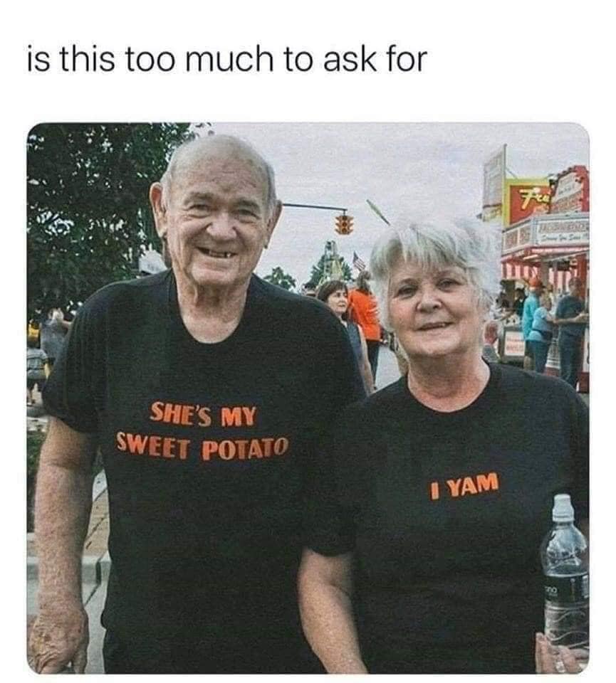 A wholesome relationship goals classic meme photo showing an elderly couple wearing matching black t-shirts reading "SHE'S MY SWEET POTATO" and "I YAM."