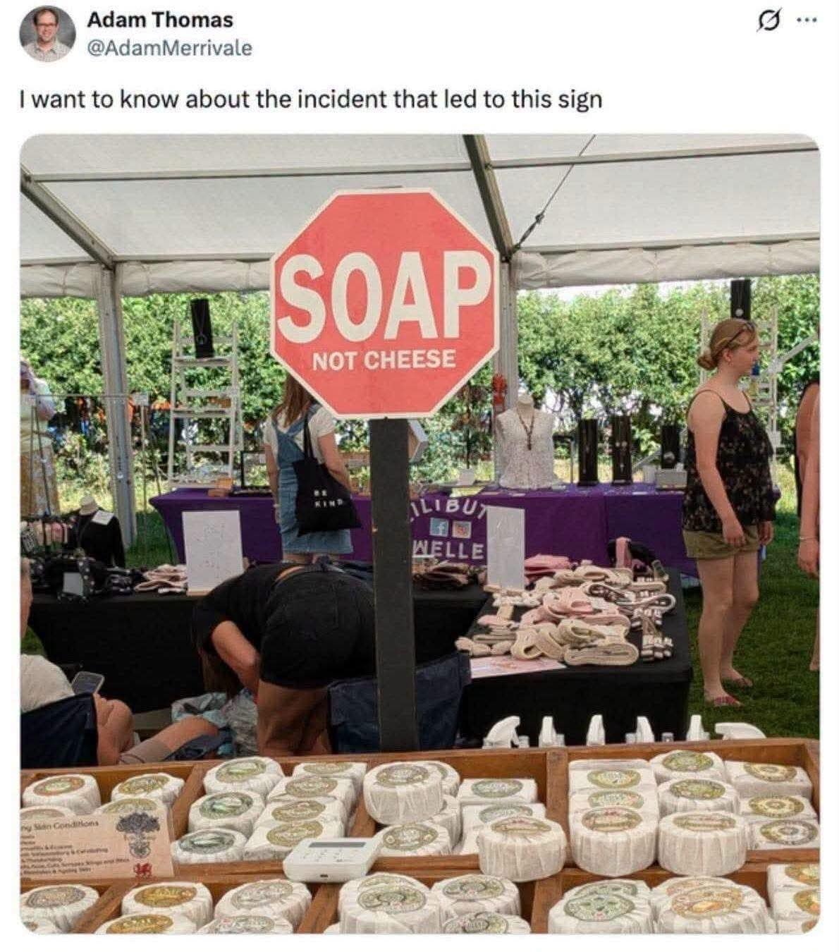 Farmers market warning sign featured in this old memes style set, displaying a red octagonal "SOAP NOT CHEESE" sign directly above blocks of artisanal soap.