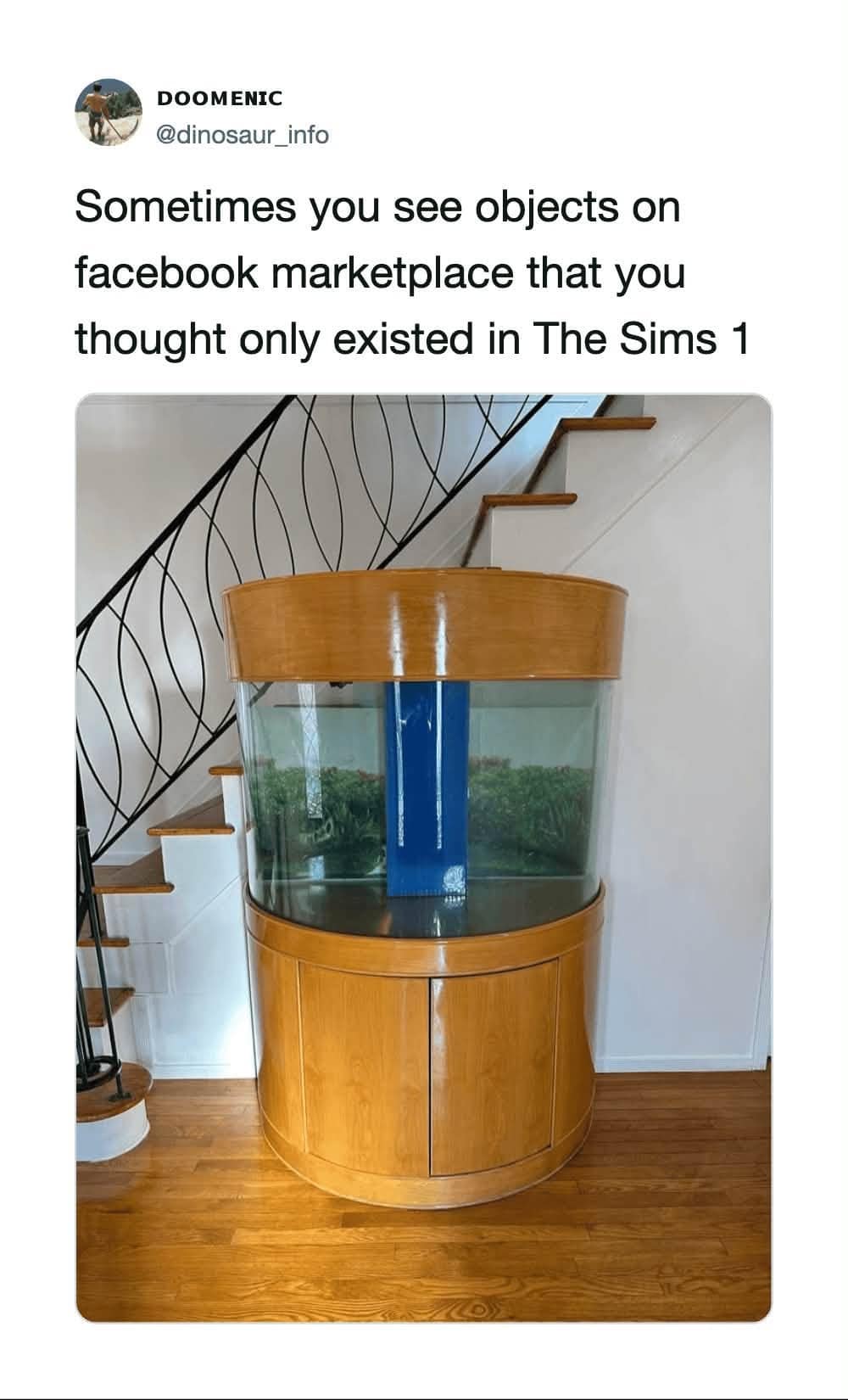 Photo of a retro circular glass fish tank built into a wooden cabinet under a staircase, compared to furniture from The Sims 1.
