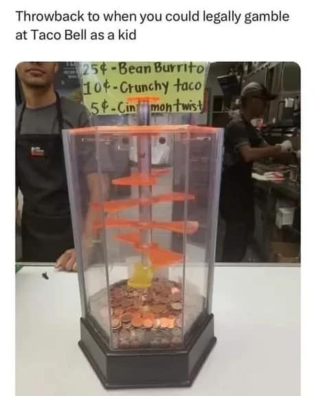 A nostalgic fast-food counter classic meme showing the transparent water-filled Taco Bell coin drop game for winning free burritos or tacos.