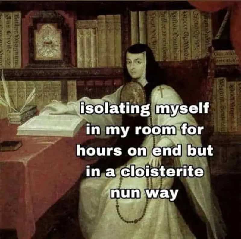 Monastic isolation humor classical art meme displaying a scholar nun seated at a desk surrounded by giant leatherbound volumes, captioned as isolating in your room in a cloistered nun way.