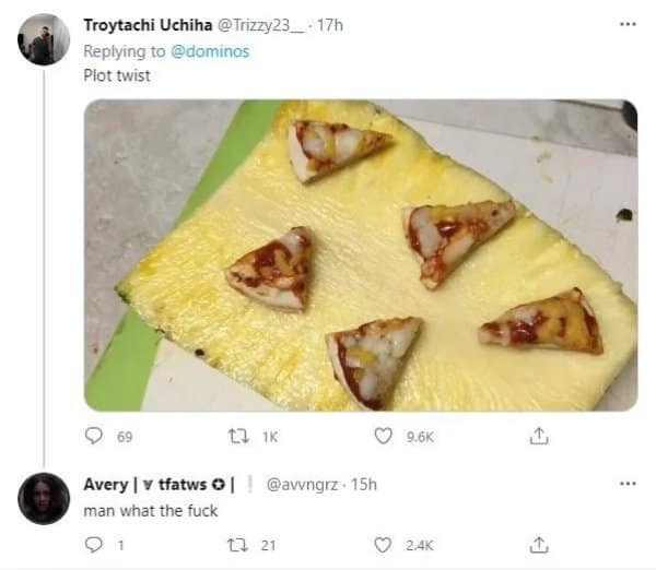 Twitter screenshot displaying the ultimate pineapple pizza plot twist featuring tiny micro-pizza slices served on top of a massive slab of raw pineapple.
