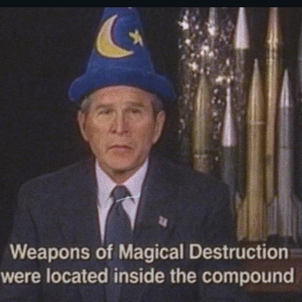 Former president George W. Bush wears a blue moon-and-stars wizard hat in front of missiles, announcing the discovery of Weapons of Magical Destruction in an iconic d&d meme.