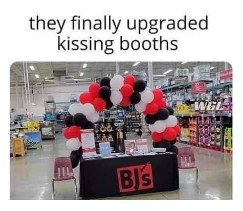 BJ's Wholesale Club promo booth with balloons captioned about upgrading kissing booths, funny memes.