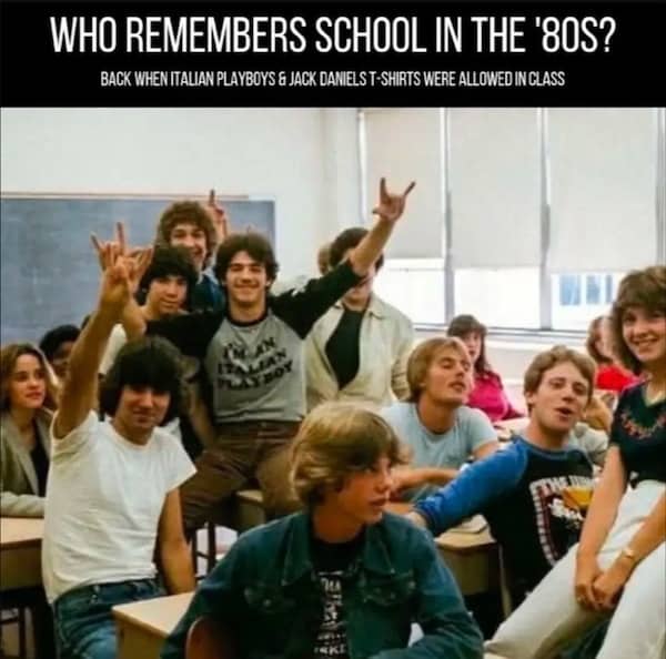 Vintage 1980s classroom photo with students making hand gestures, funny memes.
