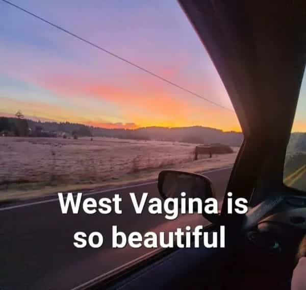 Sunset view over a landscape seen through a car window with a misspelled caption.