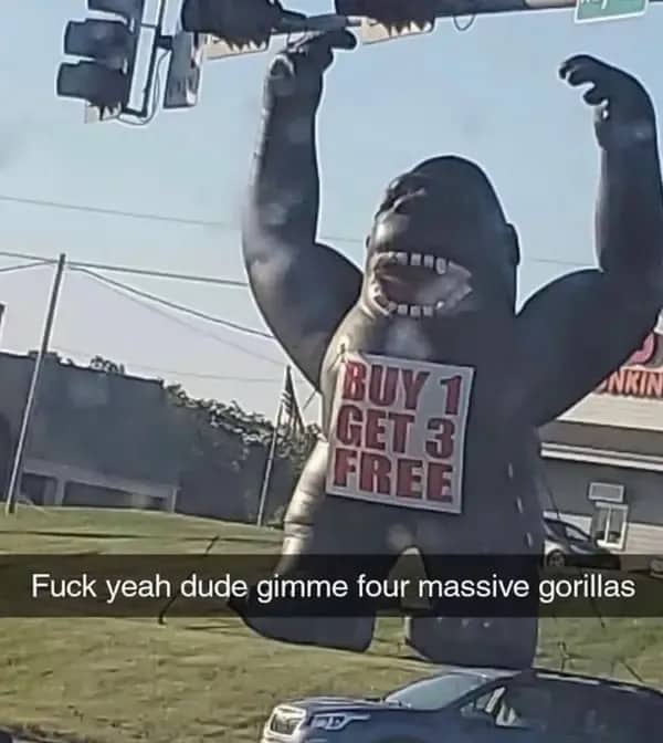 Funny Snapchat photo showing a massive inflatable gorilla outdoor advertisement with a sale sign.