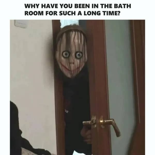 Creepy mask peeking through a door frame with bathroom time question caption, funny memes.