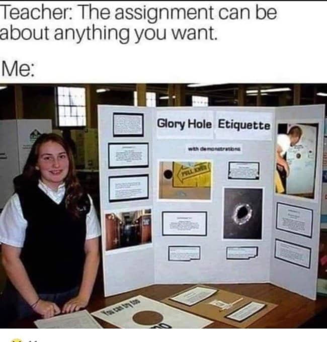 Student smiling next to a science fair display board explaining glory hole etiquette.