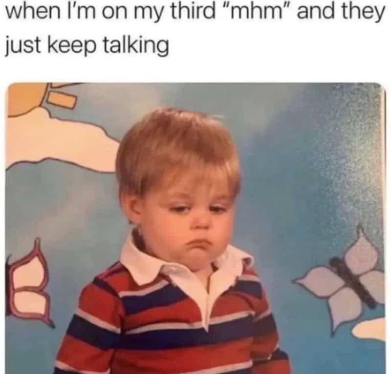 A toddler in a striped polo shirt pouts with utter exhaustion, highlighting the struggle of dealing with endless chatter in a relatable introvert meme.