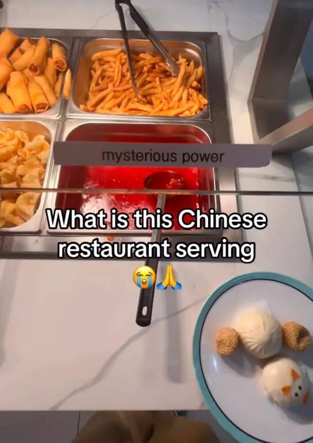 A buffet food mystery meme dump screenshot showing a tray of bright red sauce at a Chinese restaurant, tagged with a video game status bar reading "mysterious power."