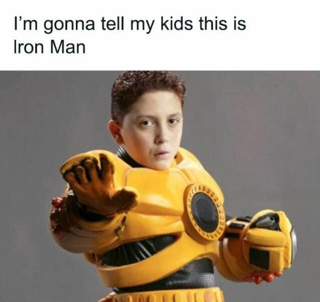 A fake pop-culture history funny meme featuring Elijah Wood in his bulky yellow suit from Spy Kids 3-D captioned "I'm gonna tell my kids this is Iron Man."