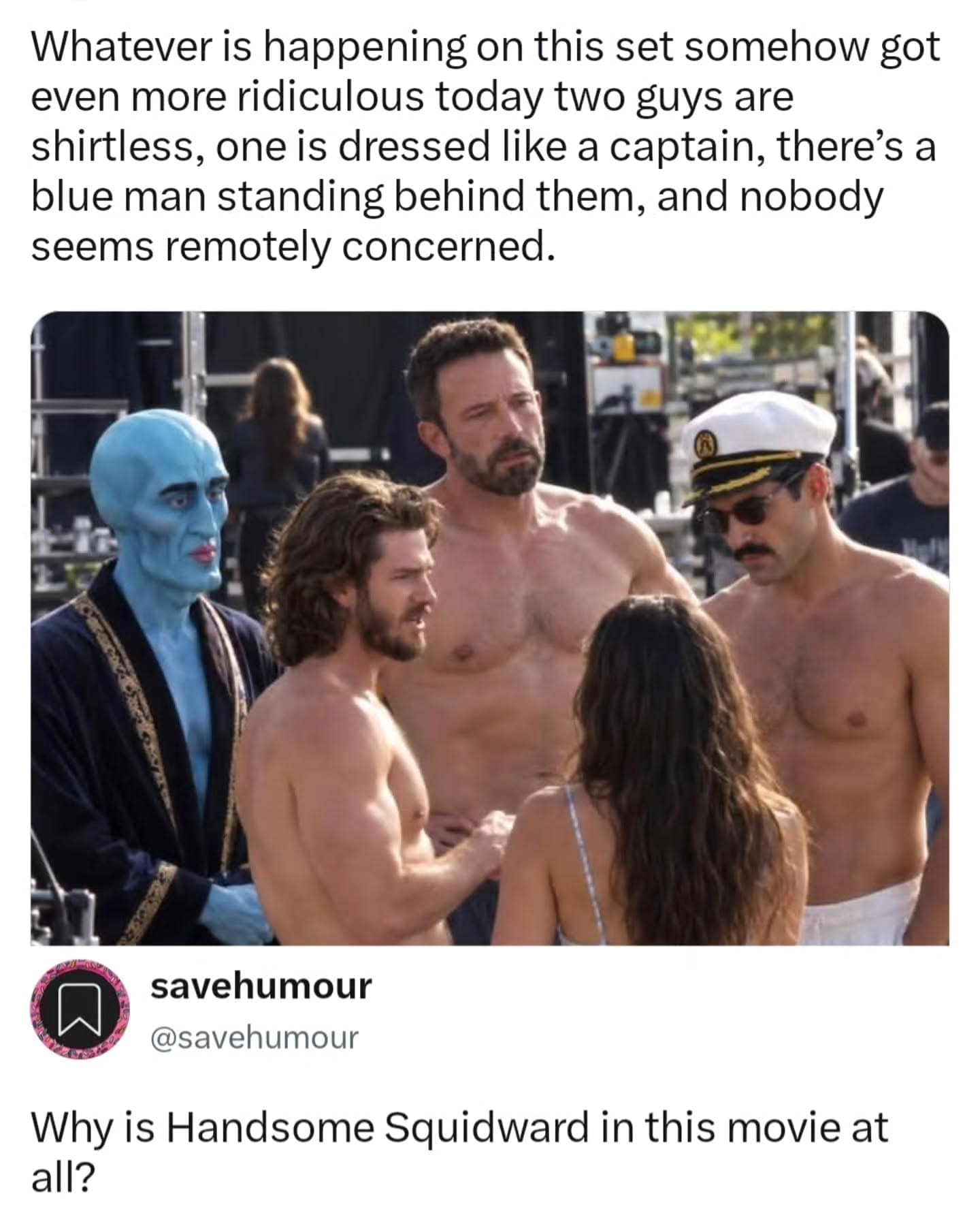 Behind-the-scenes movie set photograph of Ben Affleck and shirtless actors conversing beside an actor painted head-to-toe in blue body paint, joked about as Handsome Squidward.