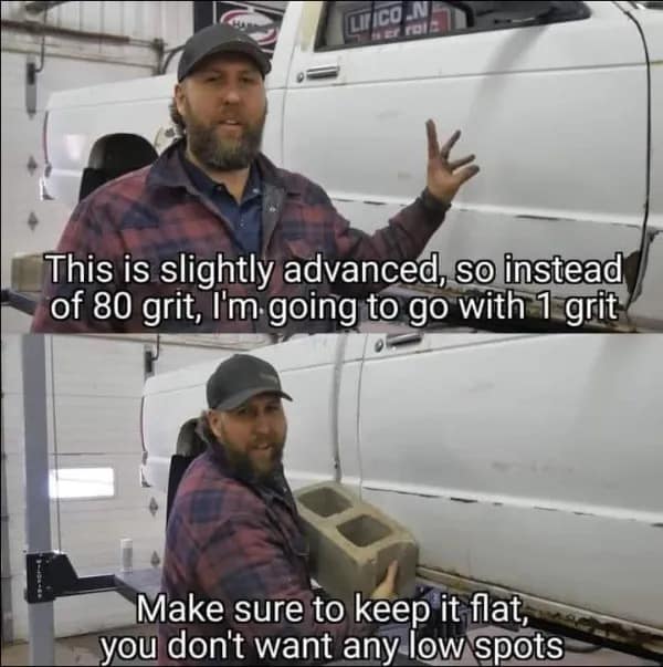 A funny DIY auto body repair video screenshot in this meme dump where a mechanic holds up a concrete cinder block as "1 grit sandpaper" to smooth out truck body panels.