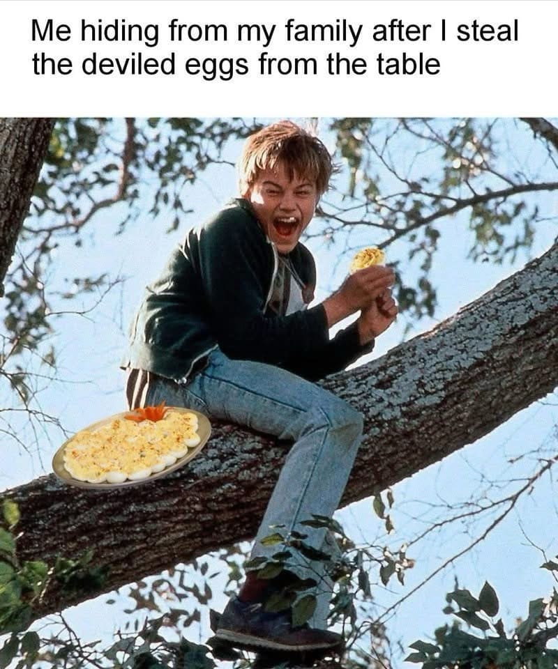 A holiday family meal theft post in a meme dump featuring Leonardo DiCaprio in a tree holding a photoshopped platter of deviled eggs.