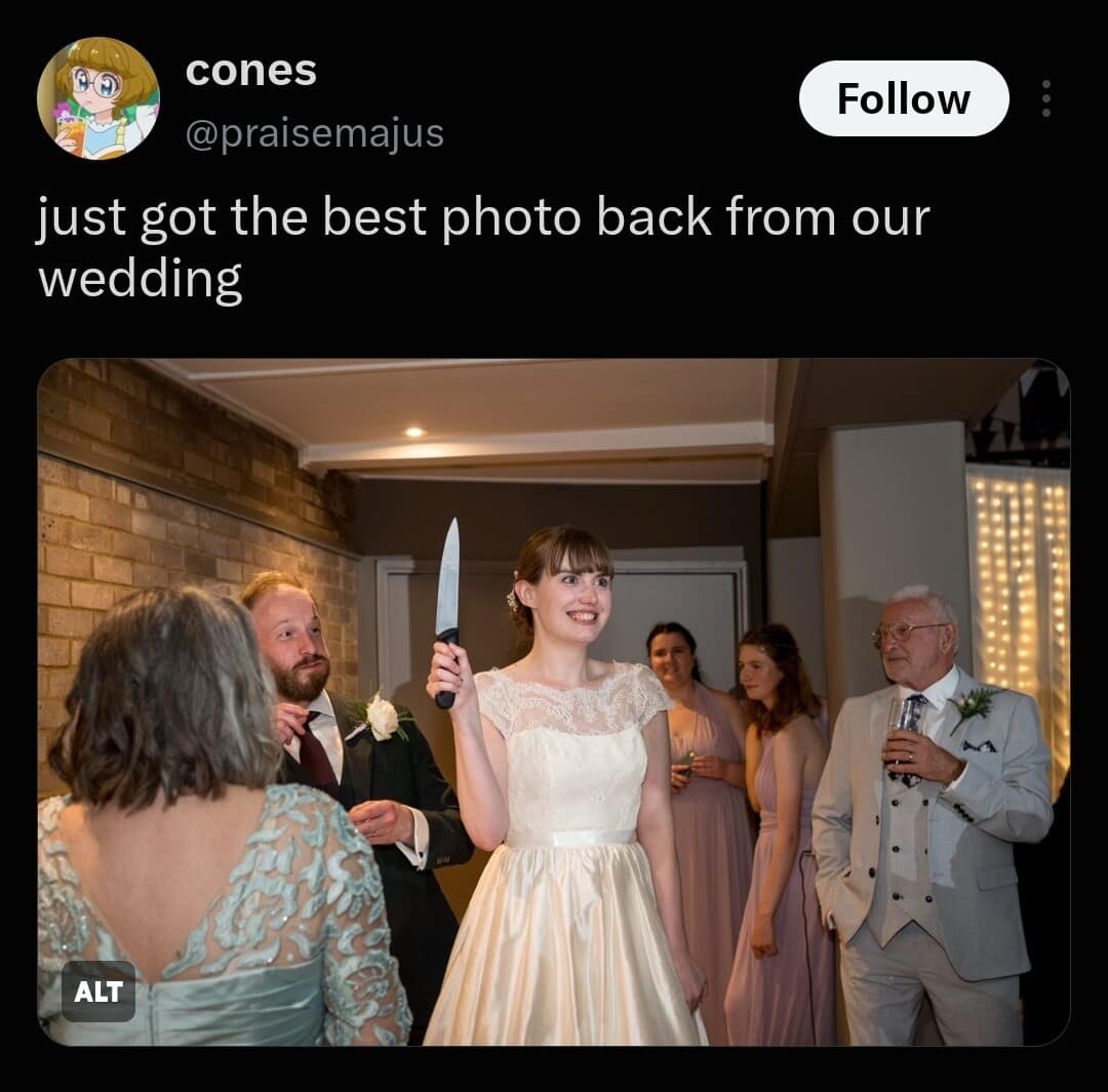An intense wedding photo tweet featured in this funny meme collection where a bride grins while brandishing a large chef's knife in front of nervous reception guests.
