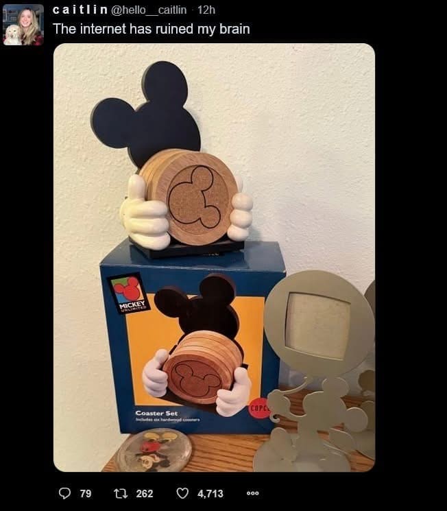 A corrupted internet brain optical illusion post in this meme dump showing a wooden Mickey Mouse coaster set whose hands holding the coasters resemble an infamous shock meme.