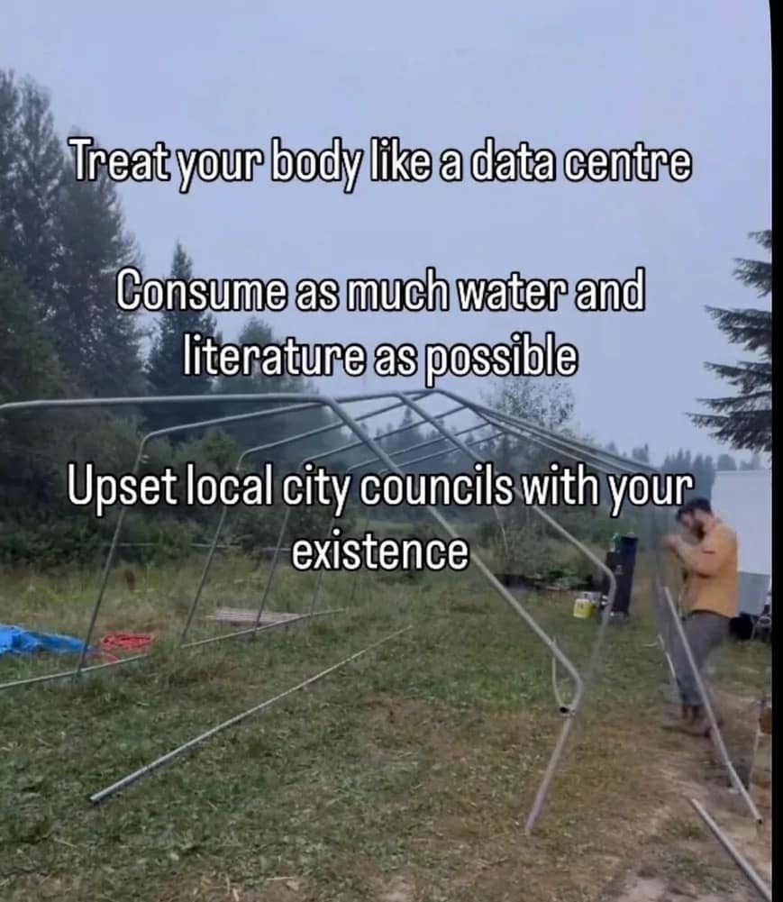 Outdoor photo of a metal canopy frame captioned with unhinged motivational advice to treat your body like a data center by drinking water and upsetting city councils.